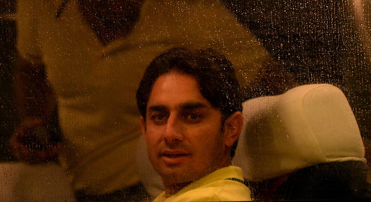 Saeed Ajmal looks out of the window of the team bus, Galle, August 2, 2014