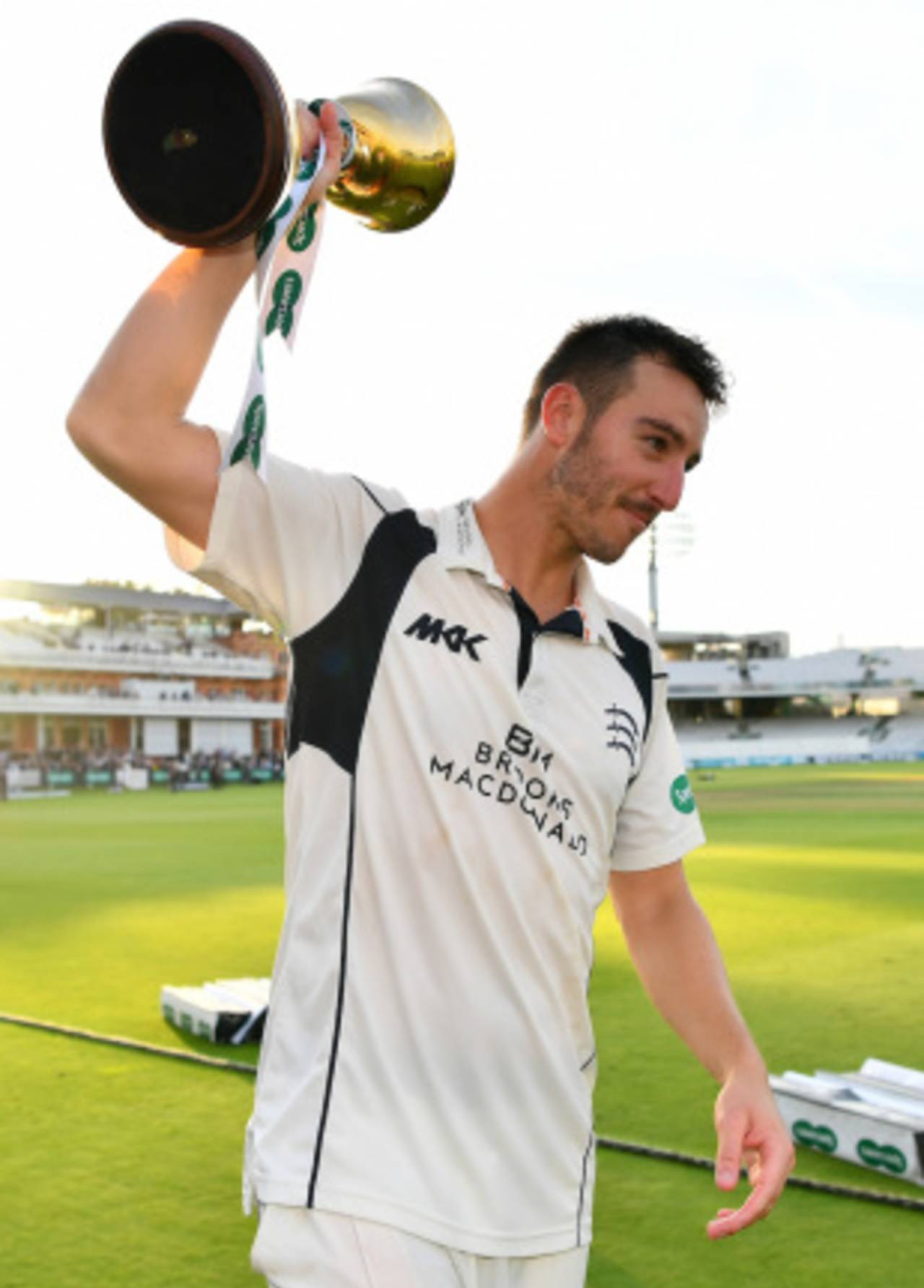 Hat-trick hero: Toby Roland-Jones with the County Championship trophy, Middlesex v Yorkshire, County Championship, Division One, Lord's, September 23, 2016
