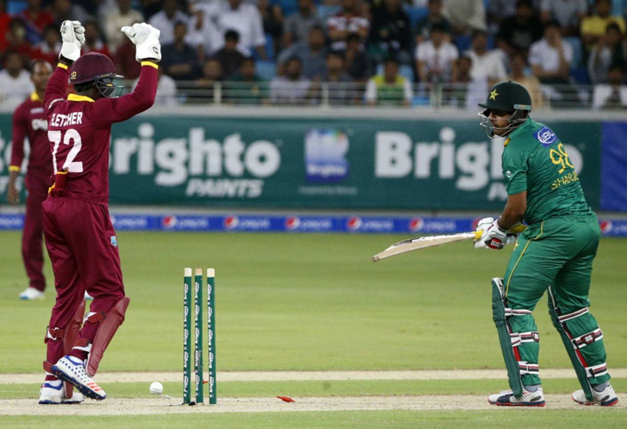 Sharjeel Khan looks back at his disturbed stumps, Pakistan v West Indies, 2nd T20I, Dubai, September 24, 2016