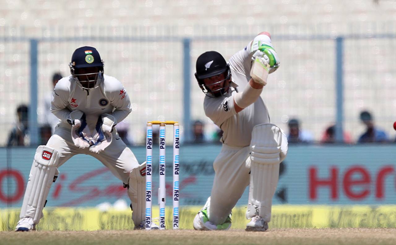 Martin Guptill gets forward and drives the ball, India v New Zealand, 2nd Test, Kolkata, 4th day, October 3, 2016
