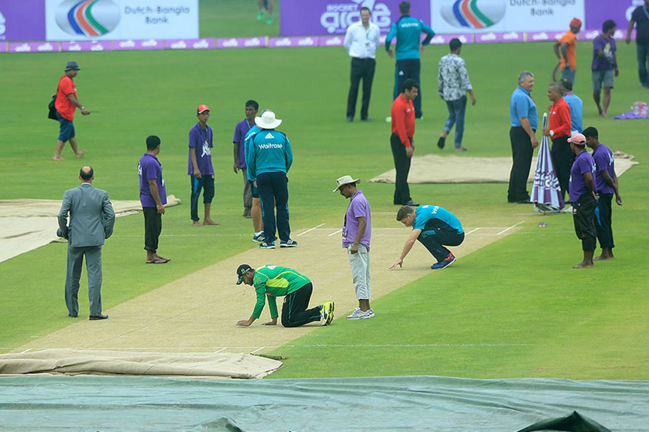 Jos Buttler and Shakib Al Hasan inspect the wicket at Chittagong, Bangladesh v England, 3rd ODI, Chittagong, October 12, 2016