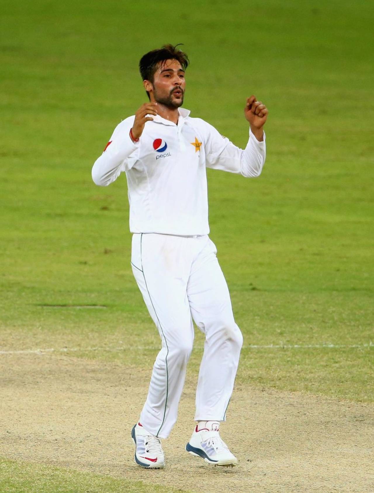 Mohammad Amir reacts after a delivery, Pakistan v West Indies, 1st Test, Dubai, 4th day, October 16, 2016