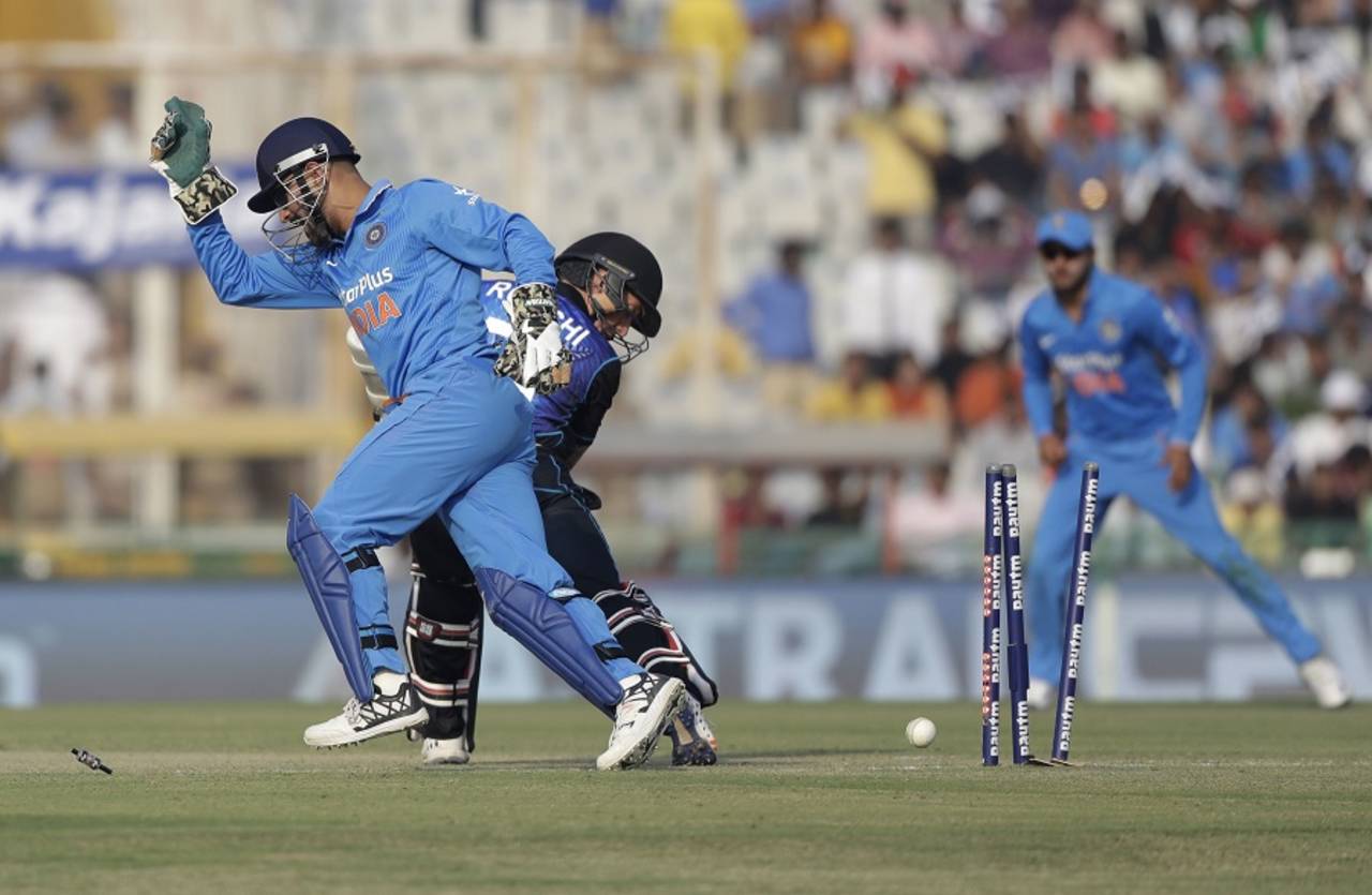 MS Dhoni pulled off two blindingly quick stumpings off Amit Mishra&nbsp;&nbsp;&bull;&nbsp;&nbsp;Associated Press