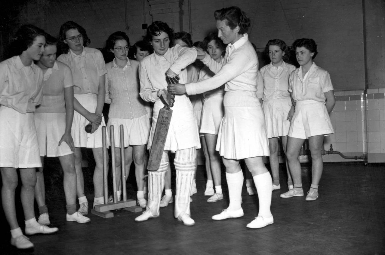 The Kent wicketkeeper coaches young players on how to play the forward defence, Eltham, January 31, 1953