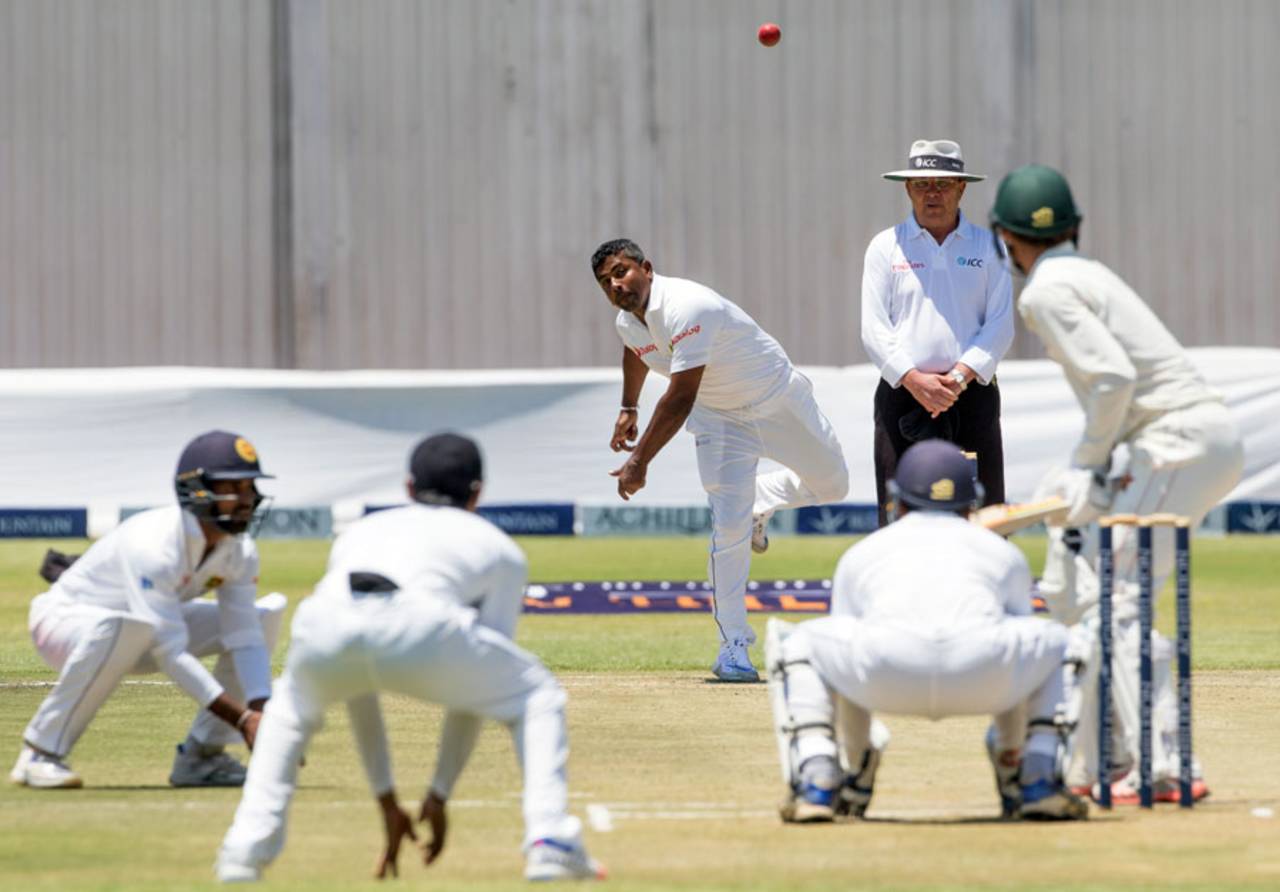 Rangana Herath bowls to a packed infield, Zimbabwe v Sri Lanka, 1st Test, Harare, 3rd day, October 31, 2016