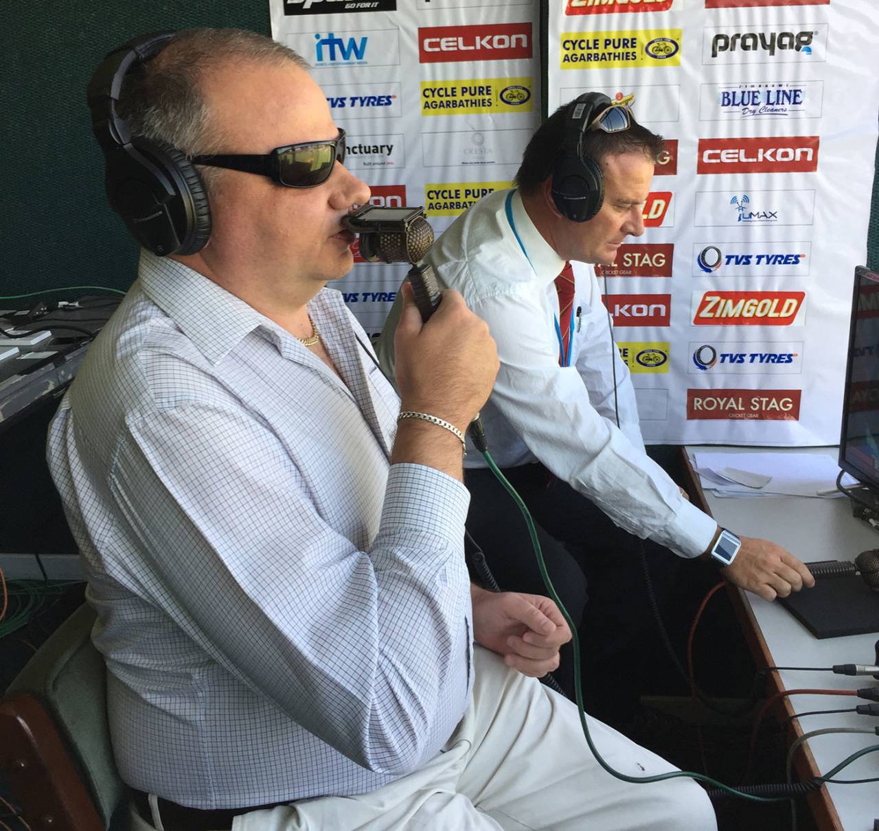 Visually impaired commentator Dean du Plessis behind the microphone
