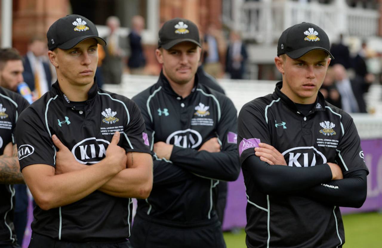 Tom Curran and Sam Curran, with Jason Roy in the background, look on after Surrey's defeat in the Royal London Cup final at Lord's, September 17, 2016