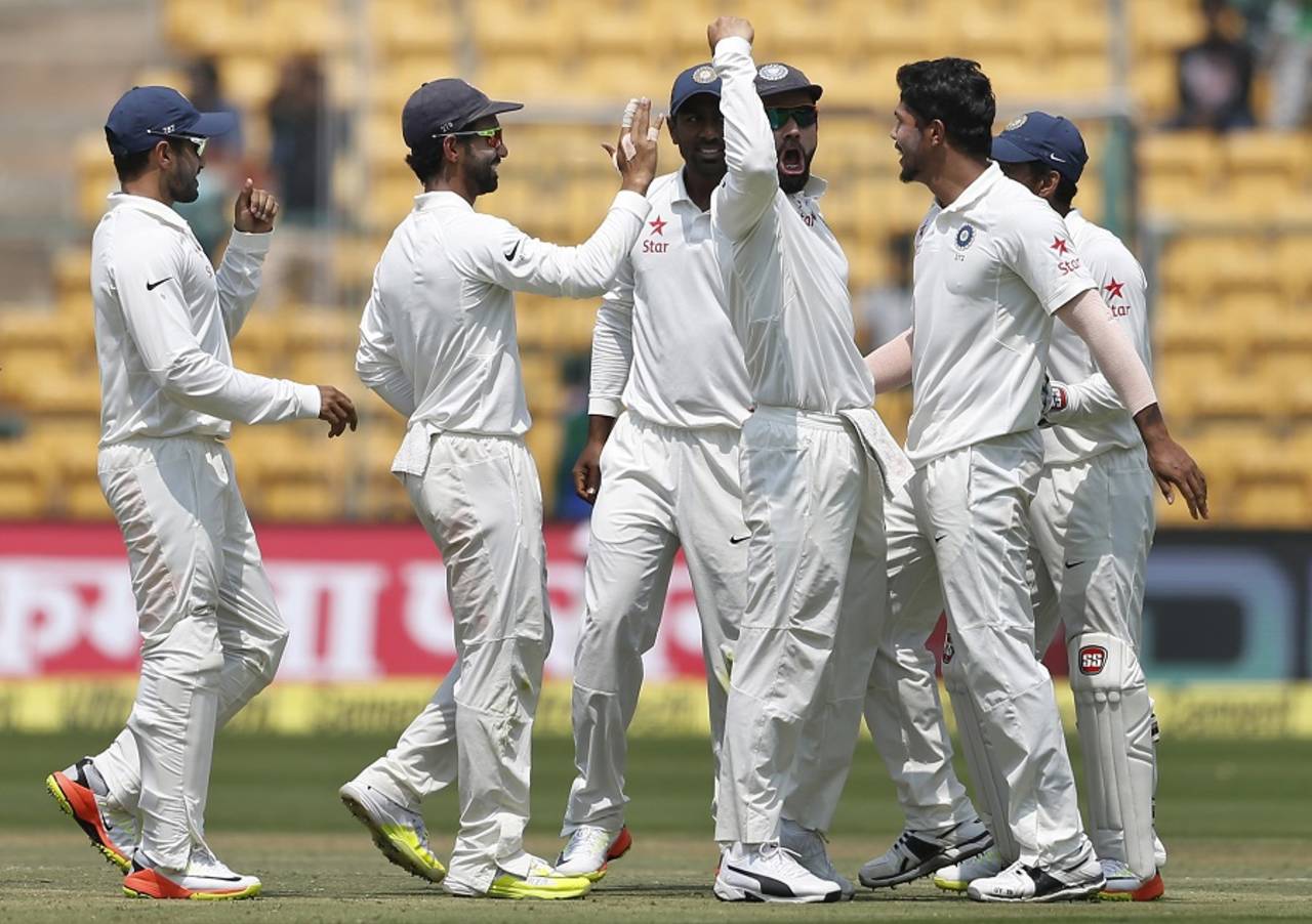 India's players are ecstatic in celebration after the dismissal of Steven Smith, India v Australia, 2nd Test, Bengaluru, 4th day, March 7, 2017