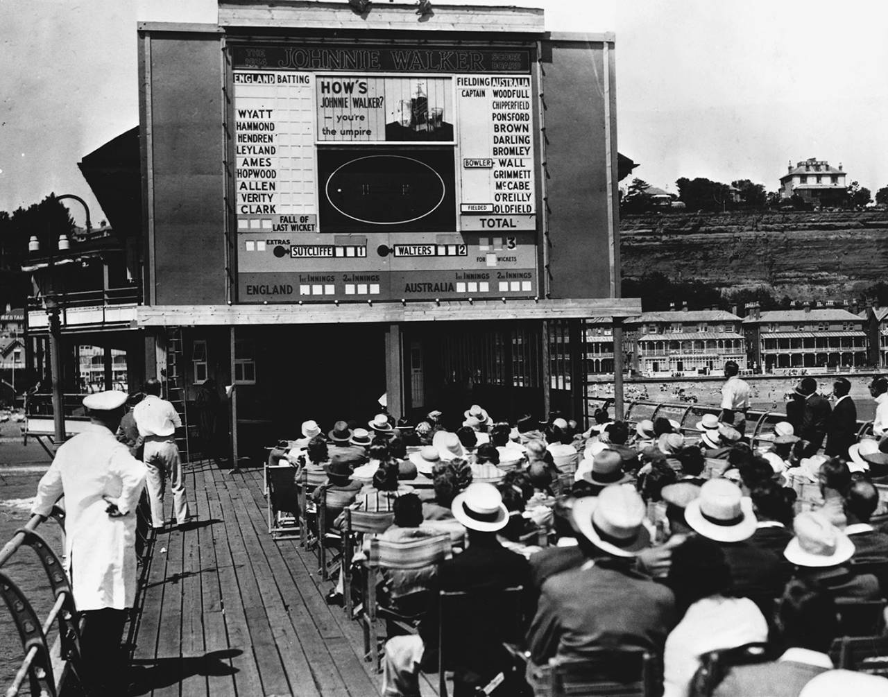 Cricket fans in the Isle of Wight follow the 1934 Old Trafford Ashes Test through a scoreboard on the pier&nbsp;&nbsp;&bull;&nbsp;&nbsp;Getty Images