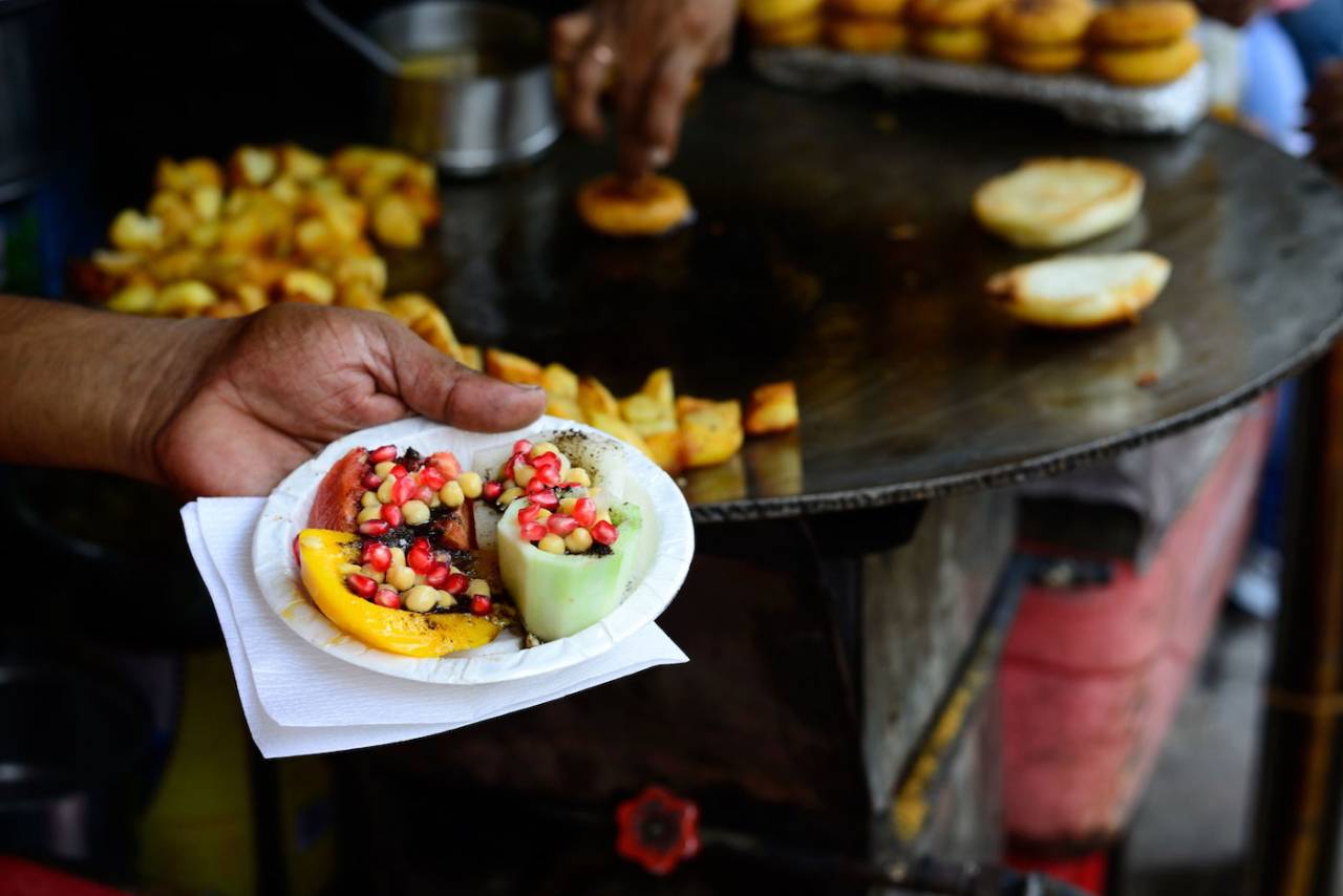 Fruit <i>chaat</i> is a mysterious sweet-savoury Delhi concoction of fruits, veggies and secret spices