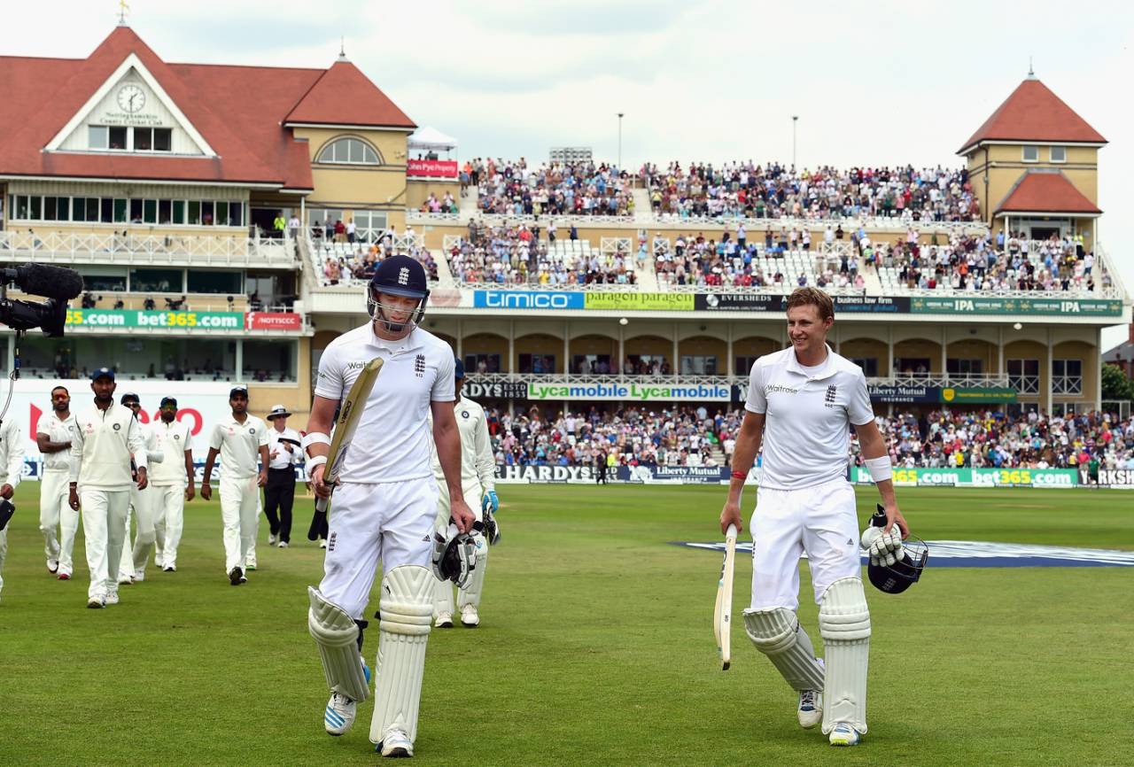 James Anderson and Joe Root walk off for a well-earned lunch, England v India, 1st Test, Trent Bridge, 4th day, July 12, 2014