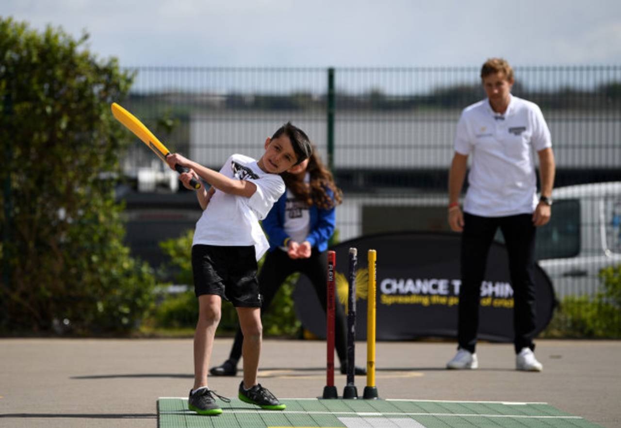 Joe Root coaches school children during a visit to his former school, Dore Primary School, Sheffield, April 25, 2017