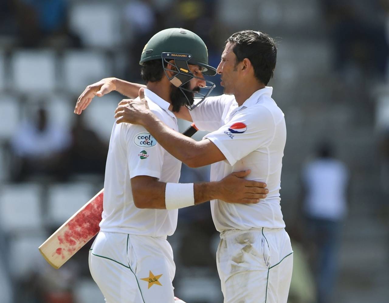 Misbah-ul-Haq is pulled into an embrace by team-mate Younis Khan after being dismissed in his final Test innings, West Indies v Pakistan, 3rd Test, Roseau, 4th day, May 13, 2017