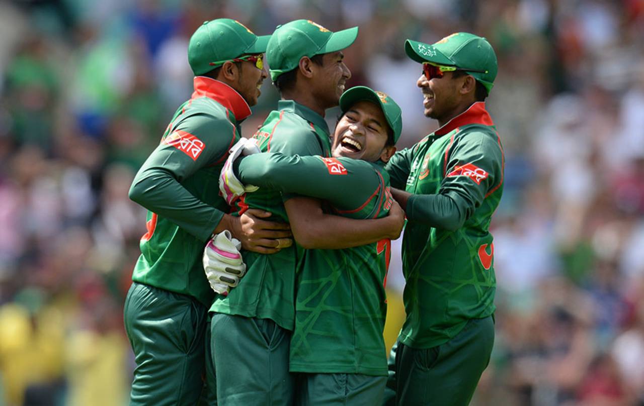 Mushfiqur Rahim embraces Mustafizur Rahman after his catch to remove Jason Roy, England v Bangladesh, Champions Trophy, Group A, The Oval, June 1, 2017