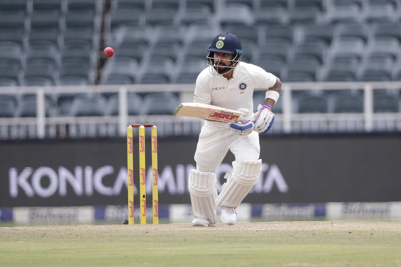 Virat Kohli taps the ball down the ground, South Africa v India, 3rd Test, Johannesburg, 3rd day, January 26, 2018