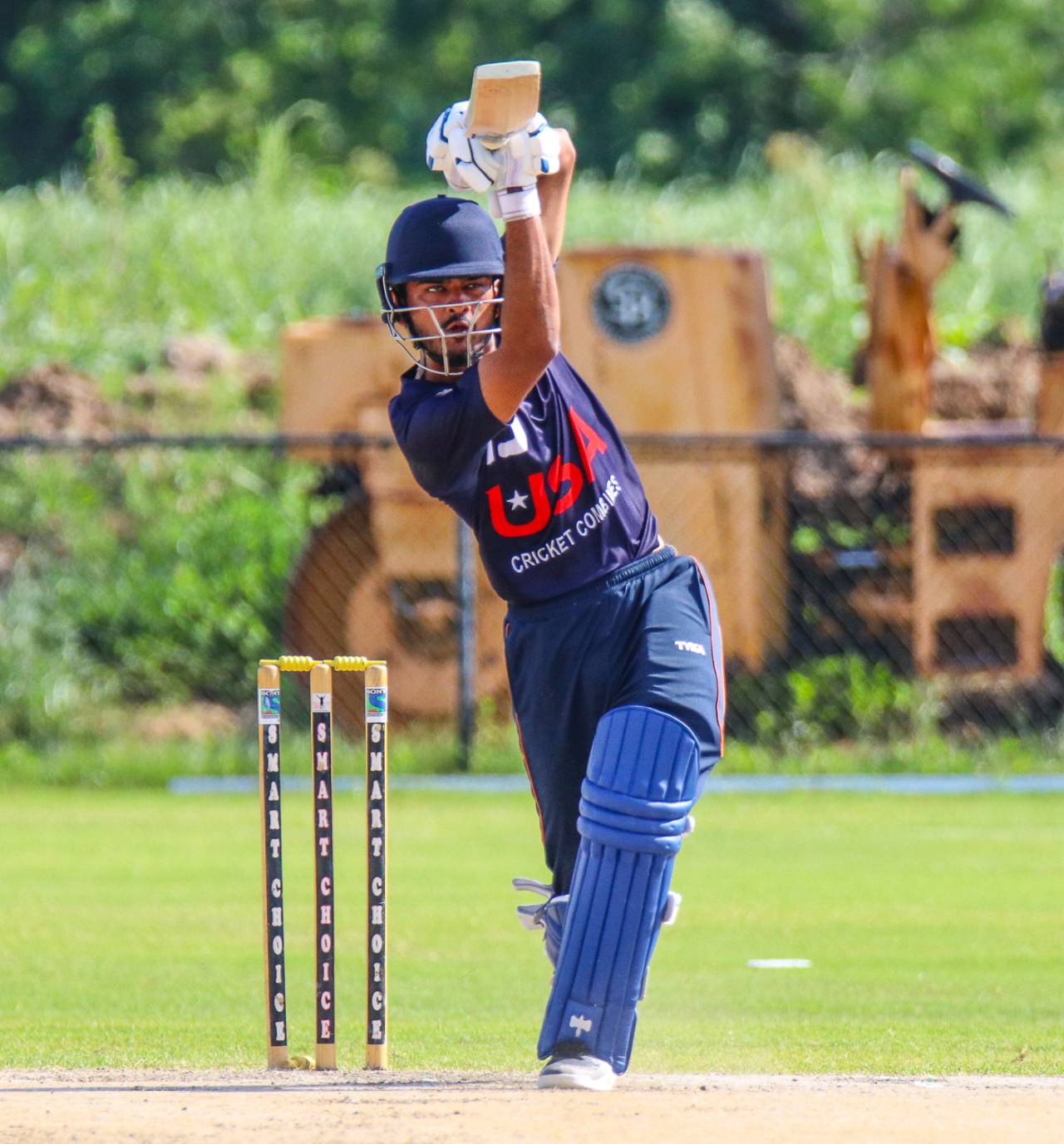 Monank Patel drives a straight six during an 80-ball century at USA selection trials, Pearland, Texas, June 24, 2018