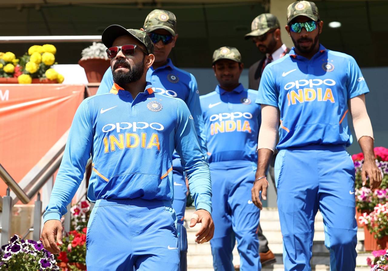 The Indian players walk out for the Ranchi ODI in their army camouflage caps, India v Australia, 3rd ODI, Ranchi, March 8, 2019