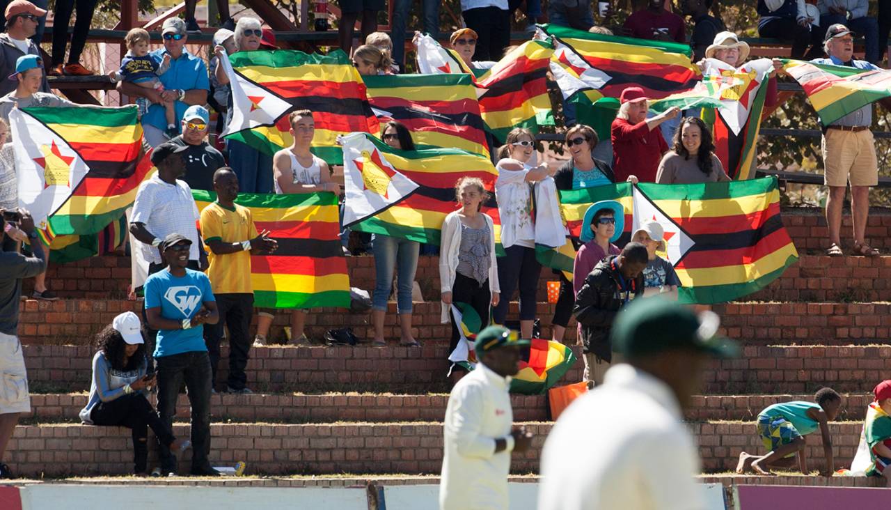 Zimbabwe supporters sing the national anthem, Day 1, 2nd Test, Zimbabwe v New Zealand, August 6, 2016