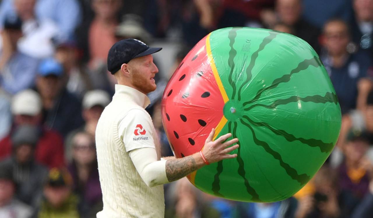 Ben Stokes deals with a giant inflatable watermelon, England v Australia, 4th Test, Day 2, Manchester, September 5, 2019