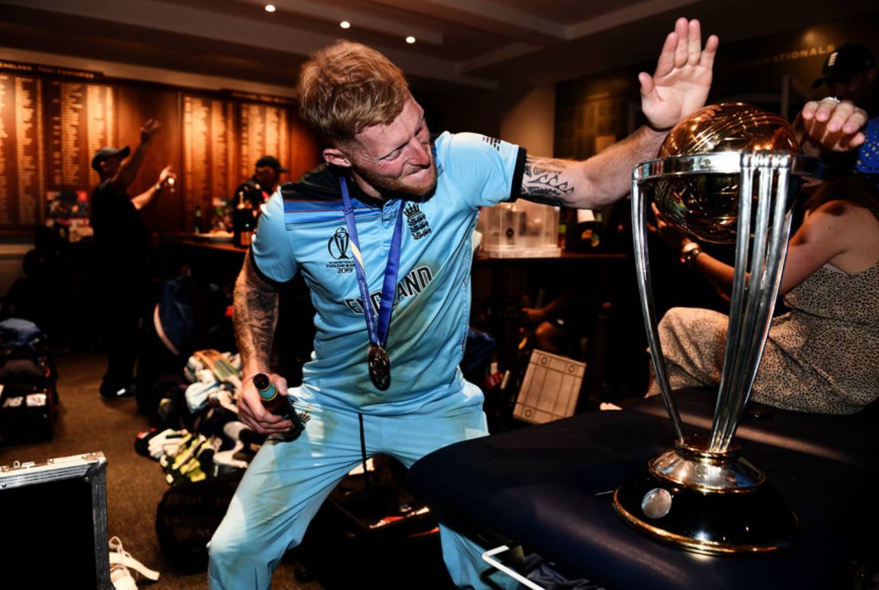 Ben Stokes looks to give the World Cup trophy a high-five, England v New Zealand, World Cup 2019 final
