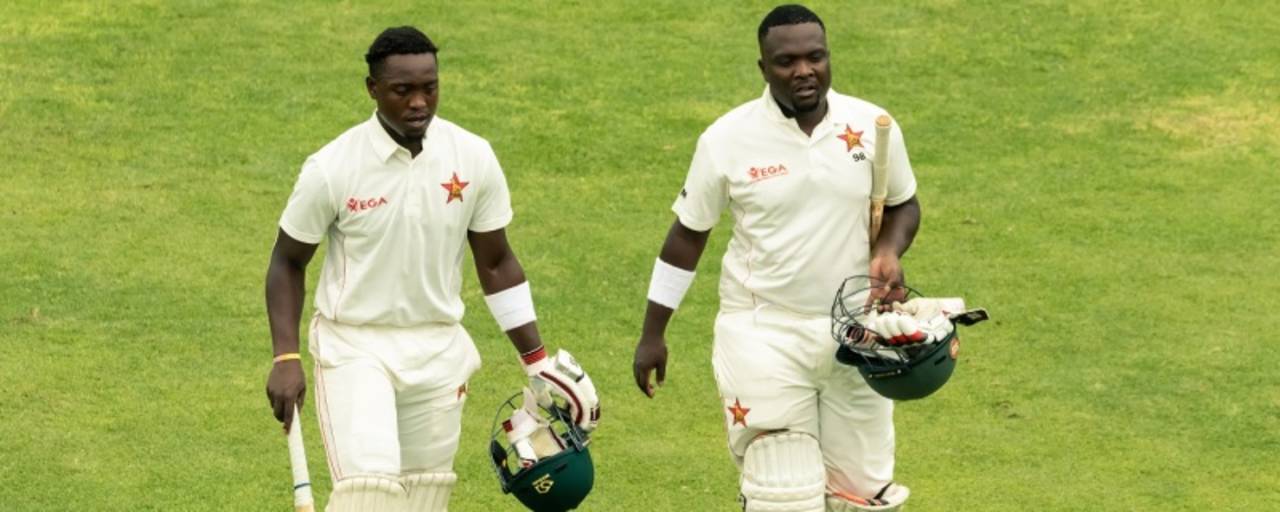 Kevin Kasuza, left, made his Test debut opening Zimbabwe's first innings, only to have to sit out the second with a delayed concussion, allowing sub Brian Mudzinganyana to make his debut&nbsp;&nbsp;&bull;&nbsp;&nbsp;AFP