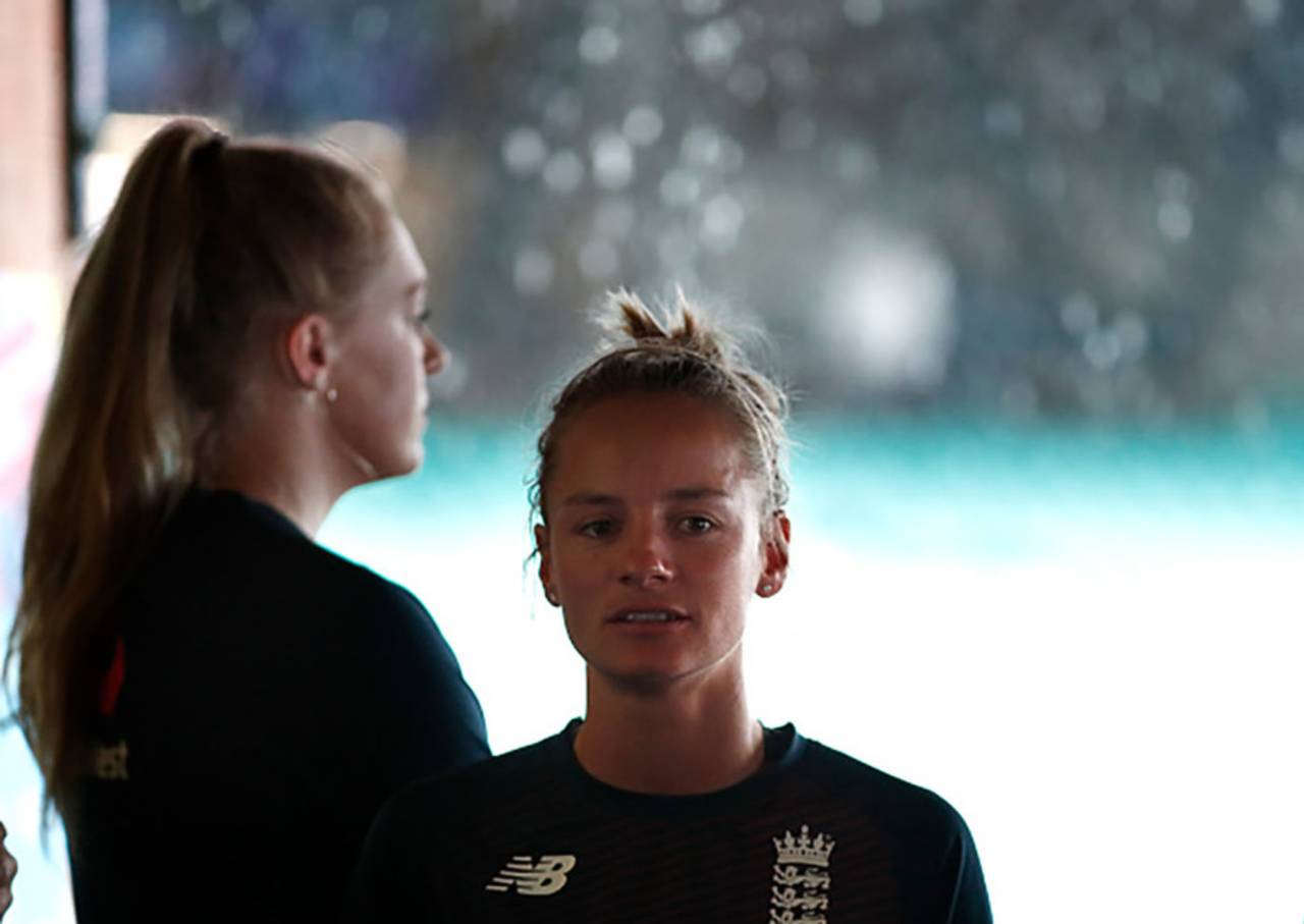 Sarah Glenn and Danni Wyatt wait for the rain to stop, India v England, Women's T20 World Cup, 1st semi-final, March 5, 2020