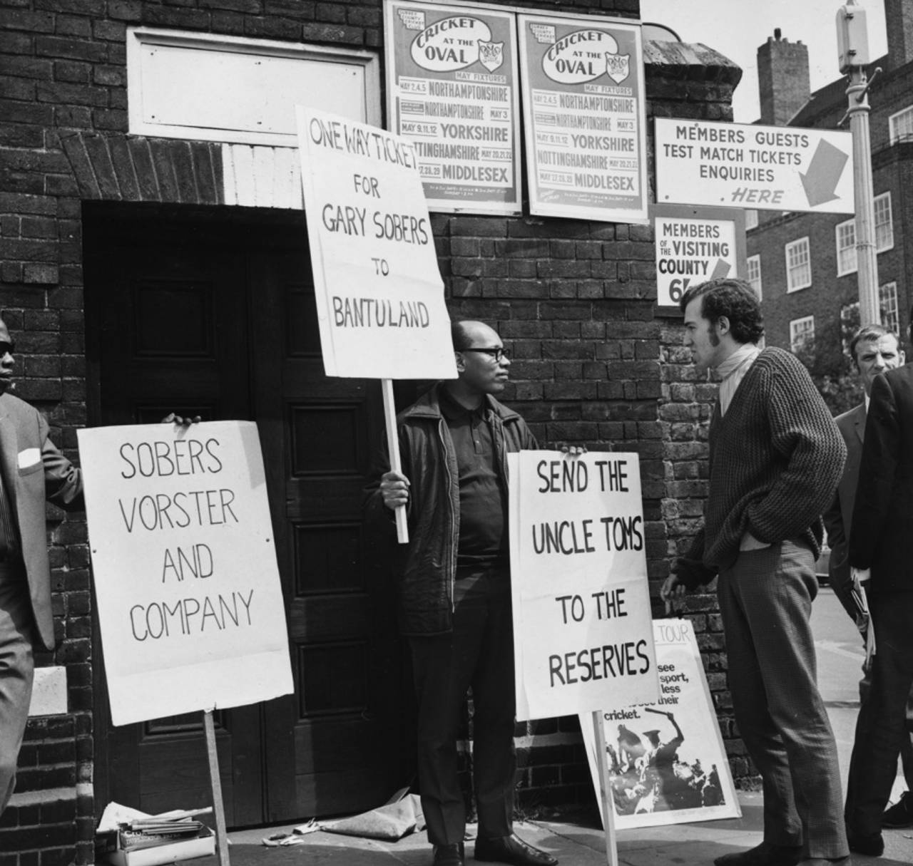 Peter Hain of the Stop the Seventy Tour campaign talks to a protester outside The Oval in May 1970&nbsp;&nbsp;&bull;&nbsp;&nbsp;Michael Webb/Getty Images