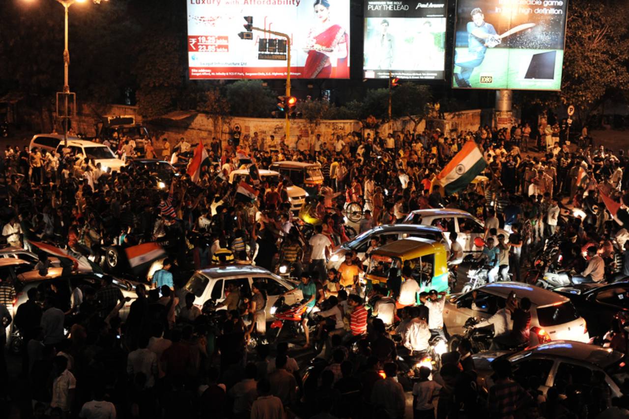People spill onto the streets of Ahmedabad to celebrate India's World Cup win, April 2, 2011