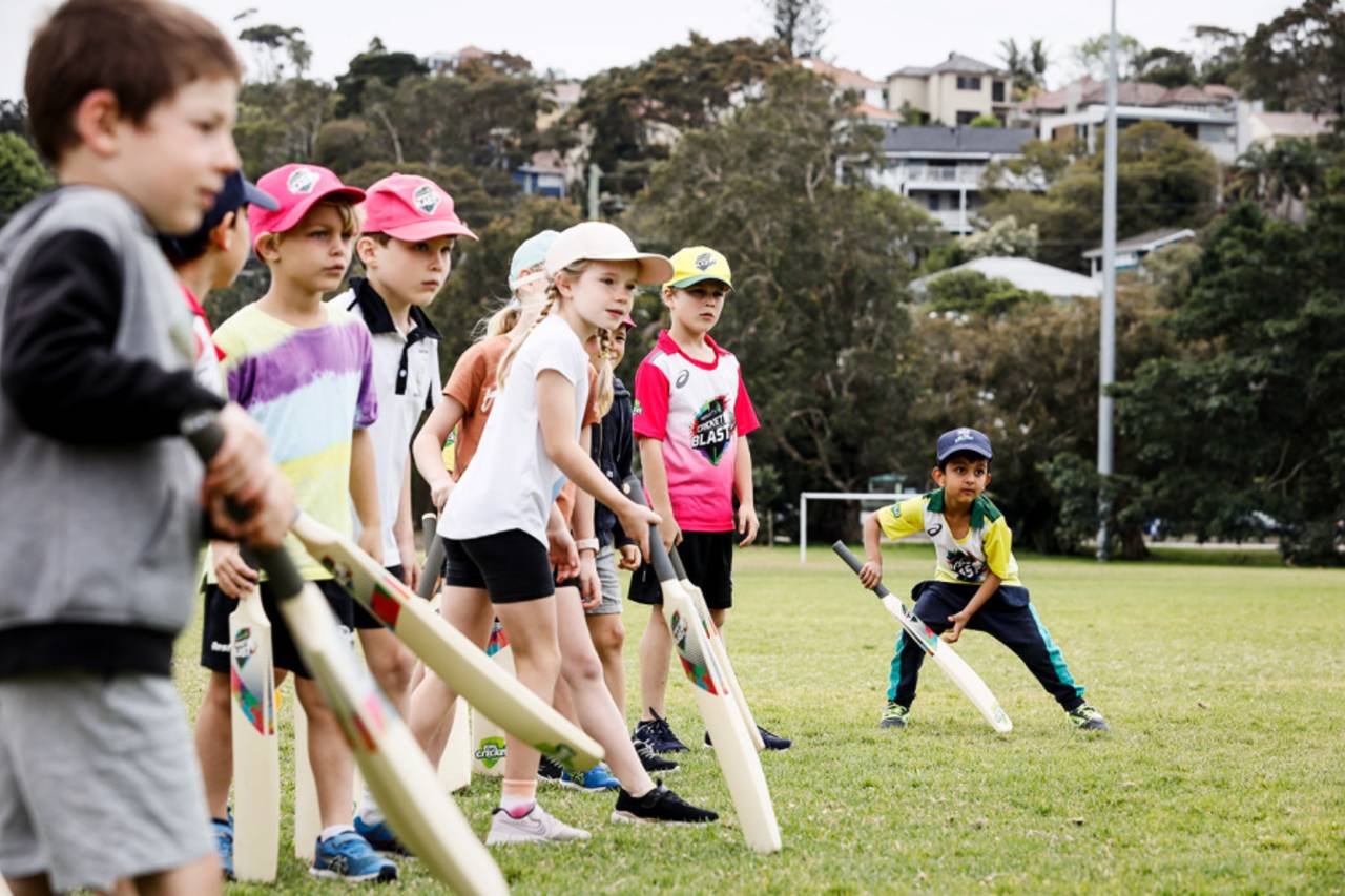 Kids play cricket during the Cumberland Regional School Holiday Program at Nolan's Reserve, Sydney, September 30, 2020