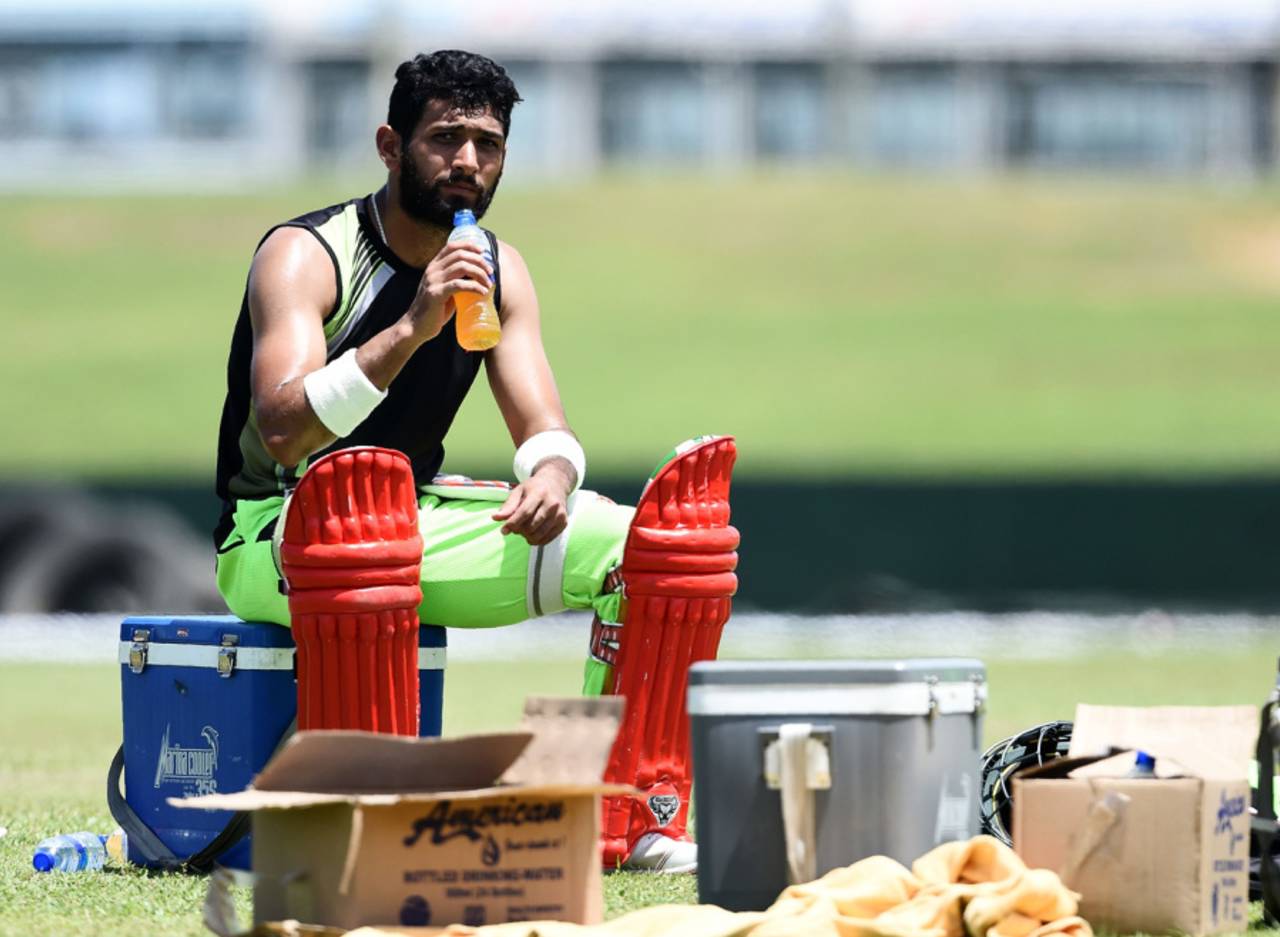 Sikandar Raza sips a drink during a training session in Galle, Colombo, June 28, 2017
