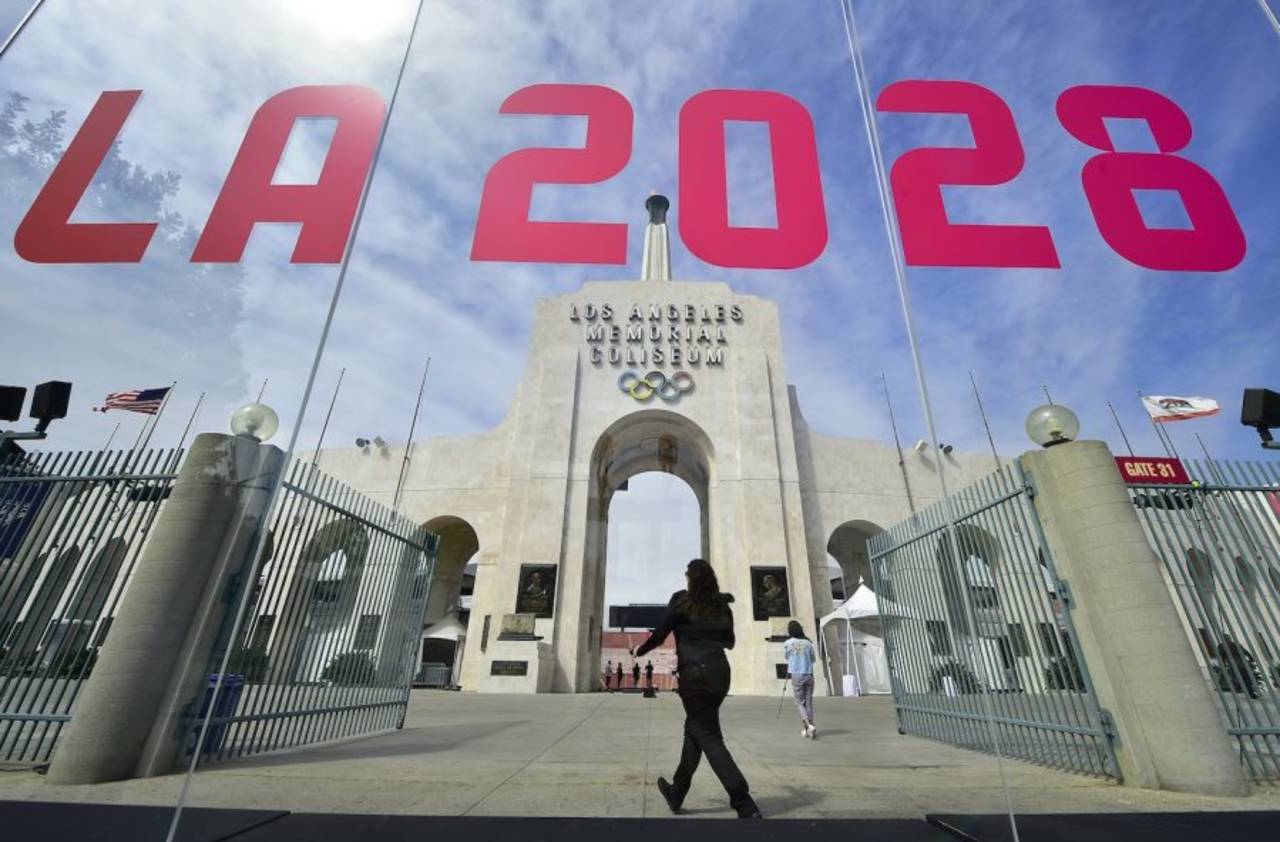 The torch is lit at the Los Angeles Coliseum after the city was officially named the host of the 2028 Summer Olympics, Los Angeles, September 13, 2017