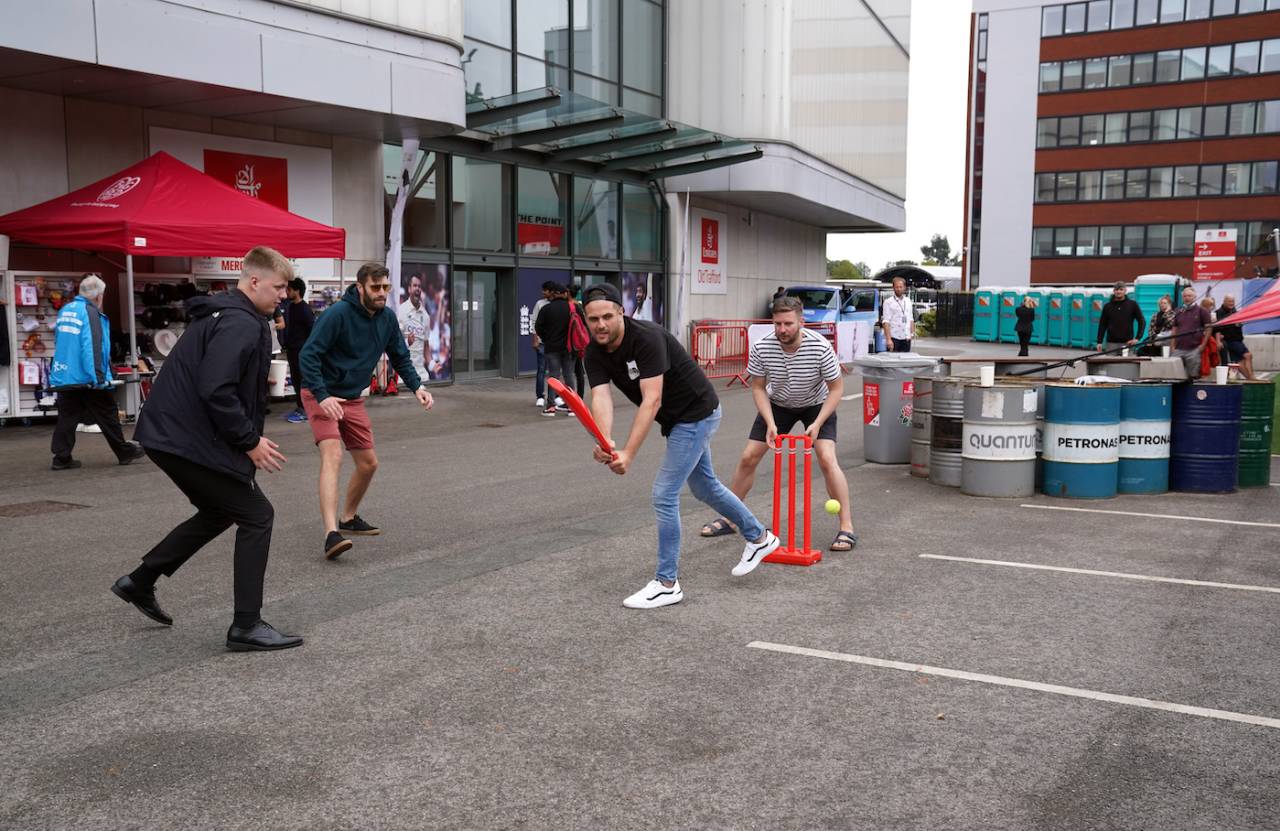 Fans play cricket outside Old Trafford after the Test was called off&nbsp;&nbsp;&bull;&nbsp;&nbsp;PA Photos/Getty Images
