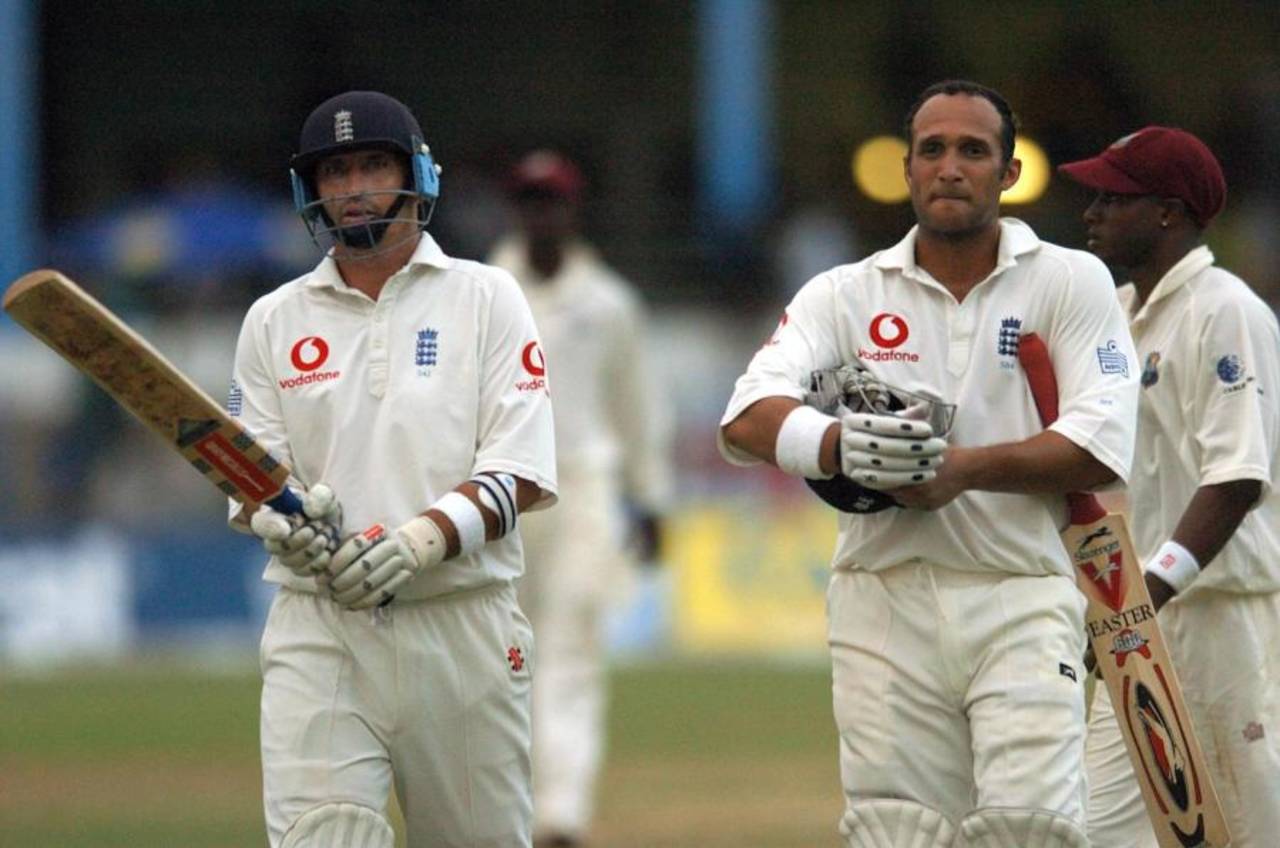 Nasser Hussain and Michael Vaughan leave the field as bad light stops play, West Indies v England, 2nd Test, Port of Spain, 4th day, March 22, 2004
