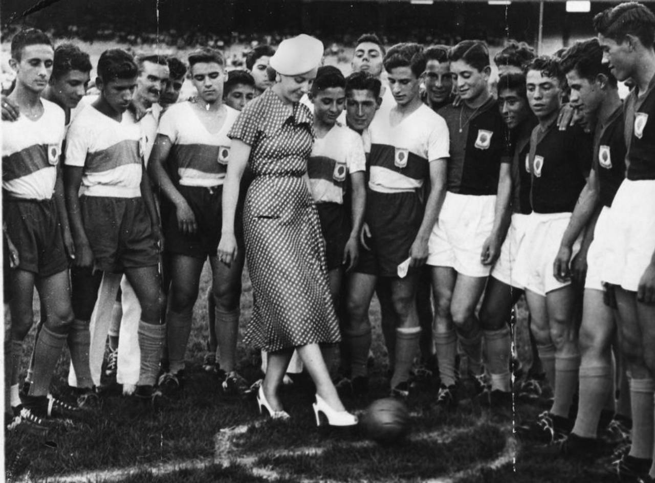 Eva Peron takes the first kick in a football match, Buenos Aires, January 26, 1951
