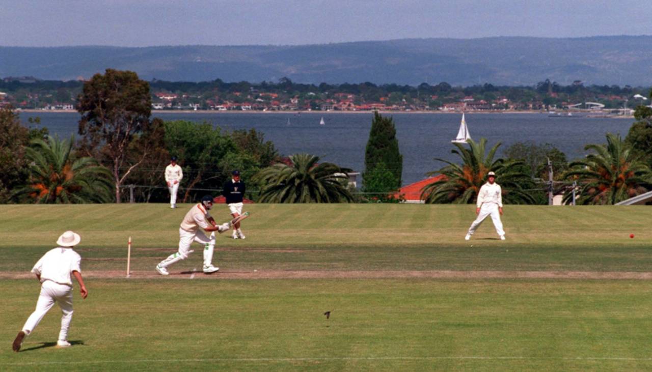 Graeme Hick bats in a practice game in a ground overlooking the Swan River in Perth, October 24, 1994