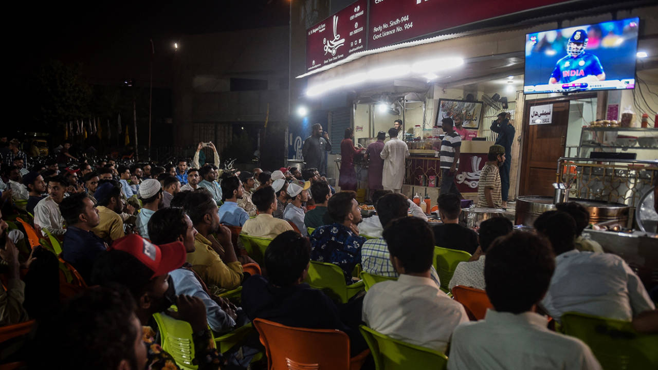 Fans in Karachi watch the India-Pakistan match on a television set up outside a restaurant, India vs Pakistan, Men's T20 World Cup 2021, Super 12s, Dubai, October 24, 2021