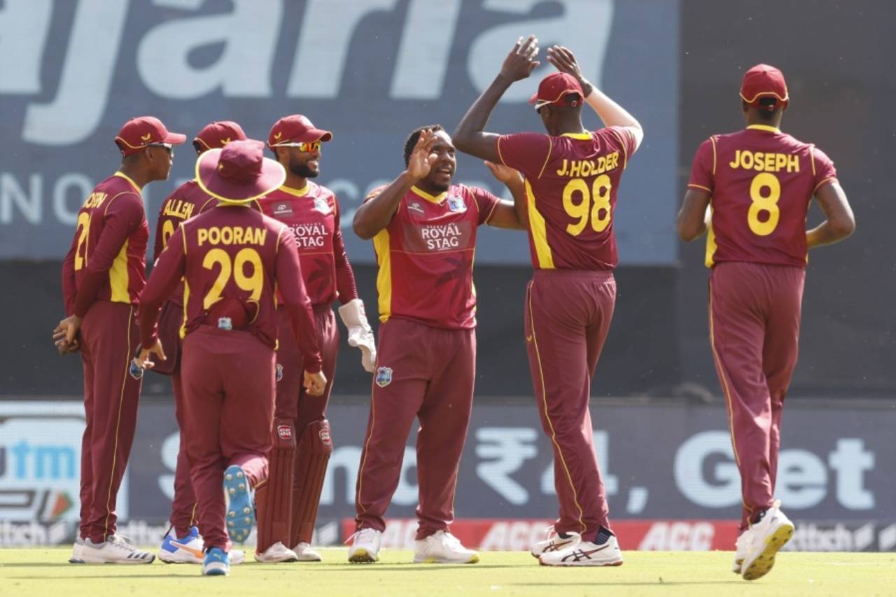Odean Smith is congratulated by his team-mates after a wicket, India vs West Indies, 2nd ODI, Ahmedabad, February 9, 2022
