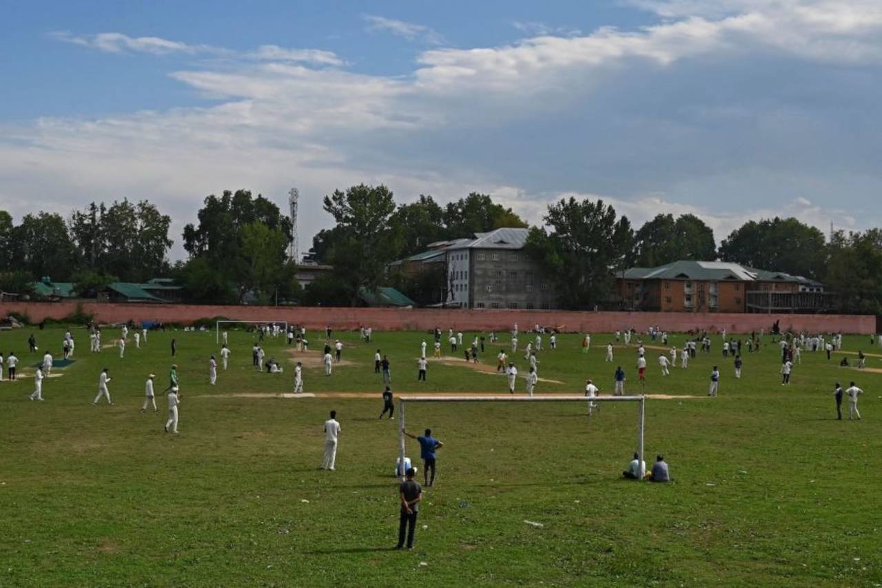 Multiple games of cricket are on at a ground in Srinagar, August 30, 2020
