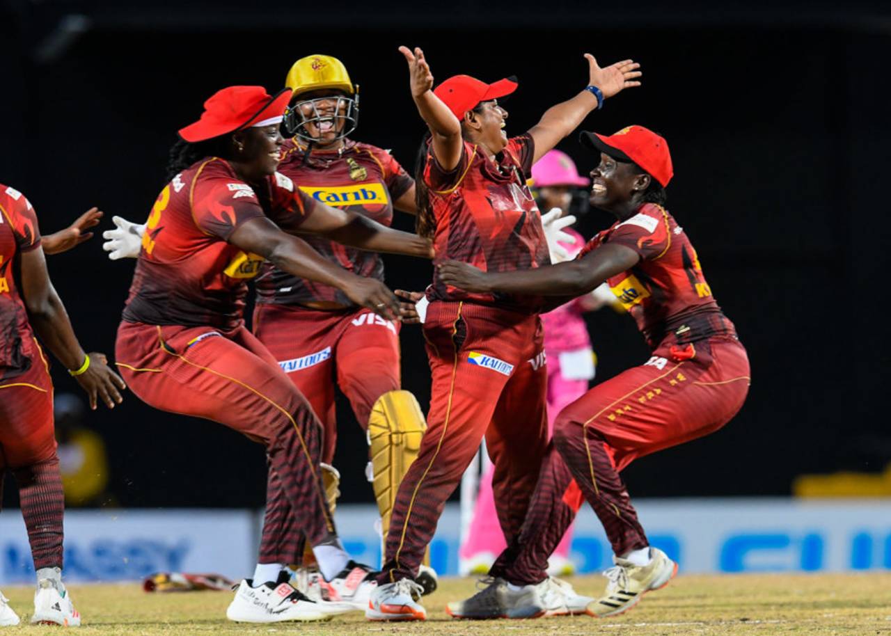 Anisa Mohammed is embraced by team-mates after taking the final wicket, Trinbago Women vs Barbados Women, WCPL final, Basseterre, September 4, 2022
