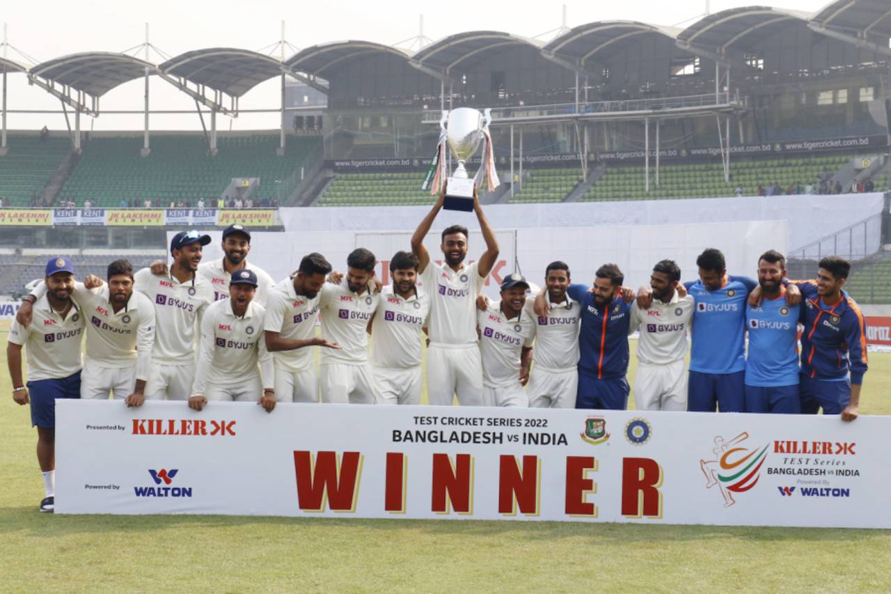 Jaydev Unadkat, who was playing his first Test after a 12-year gap, holds aloft the trophy, Bangladesh vs India, 2nd Test, Dhaka, 4th day, December 25, 2022