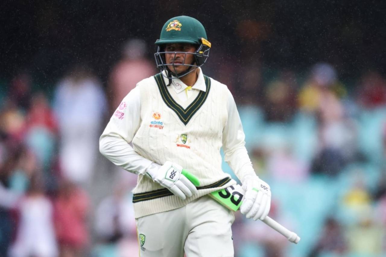 Usman Khawaja hides his bat from the rain, Australia vs South Africa, 3rd Test, Sydney, 2nd day, January 5, 2023