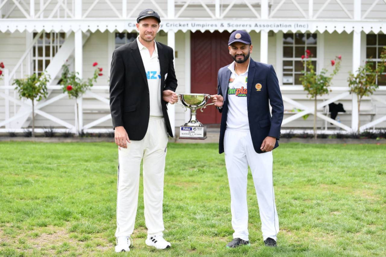 Tim Southee and Dimuth Karunaratne pose with the trophy, March 7, 2023