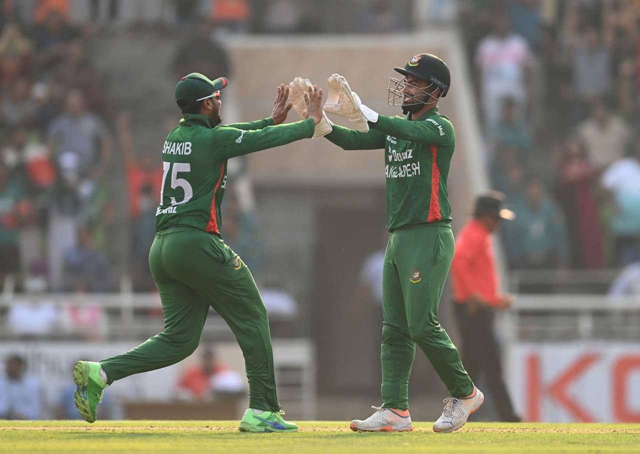 Litton Das and Shakib Al Hasan celebrate the wicket of Chris Woakes, Bangladesh vs England, 2nd T20I, Dhaka, March 12, 2023