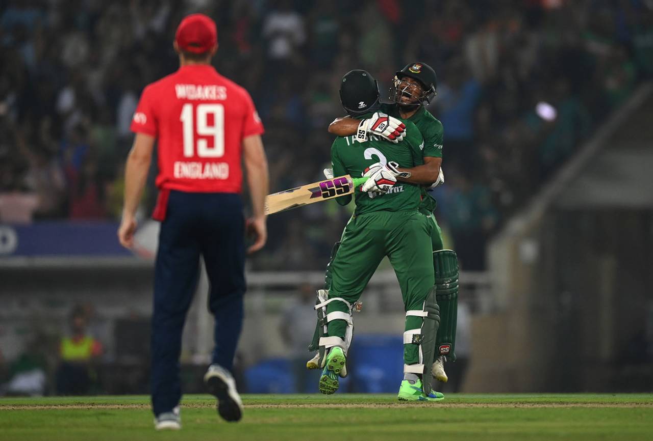 Najmul Hossain Shanto and Taskin Ahmed celebrate at the moment of victory, Bangladesh vs England, 2nd T20I, Dhaka, March 12, 2023
