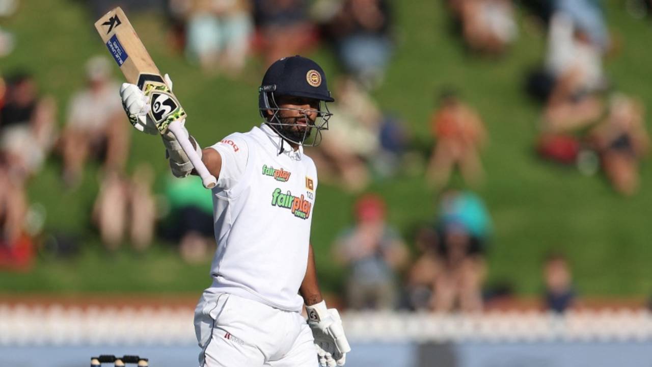 Dimuth Karunaratne brought up his second fifty of the match but was dismissed soon after • AFP/Getty Images