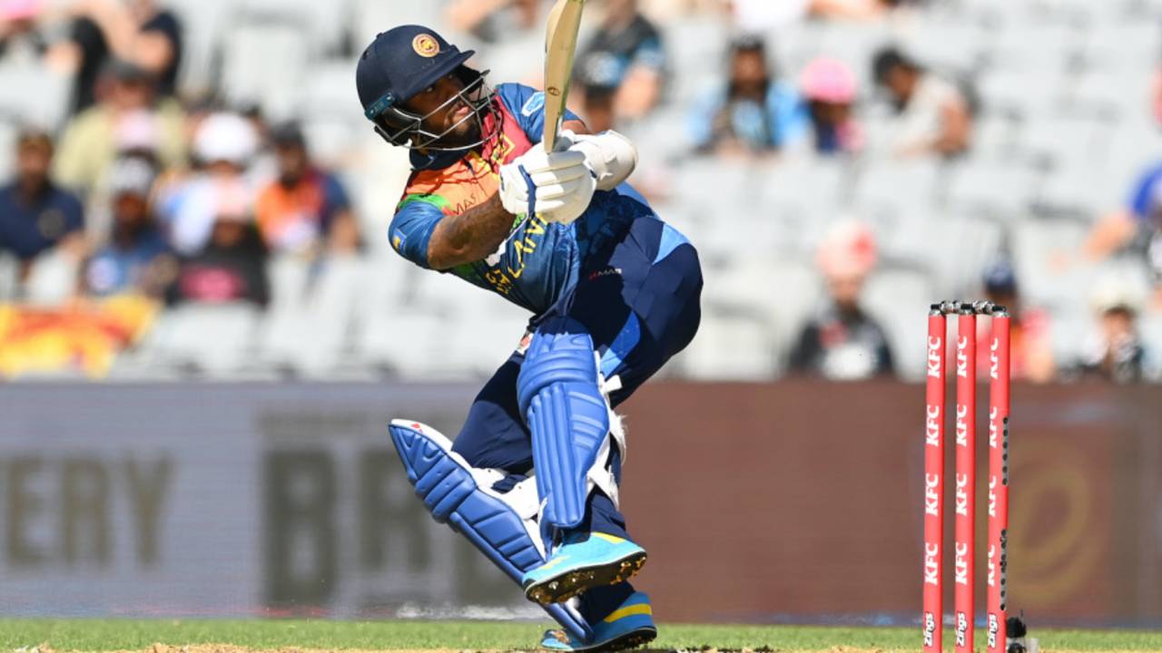 Kusal Mendis scoops one behind for a six