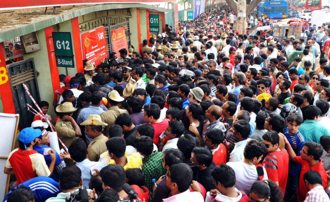 Regulating spectators' entry into cricket grounds is complicated by security measures that call for manual frisking of fans