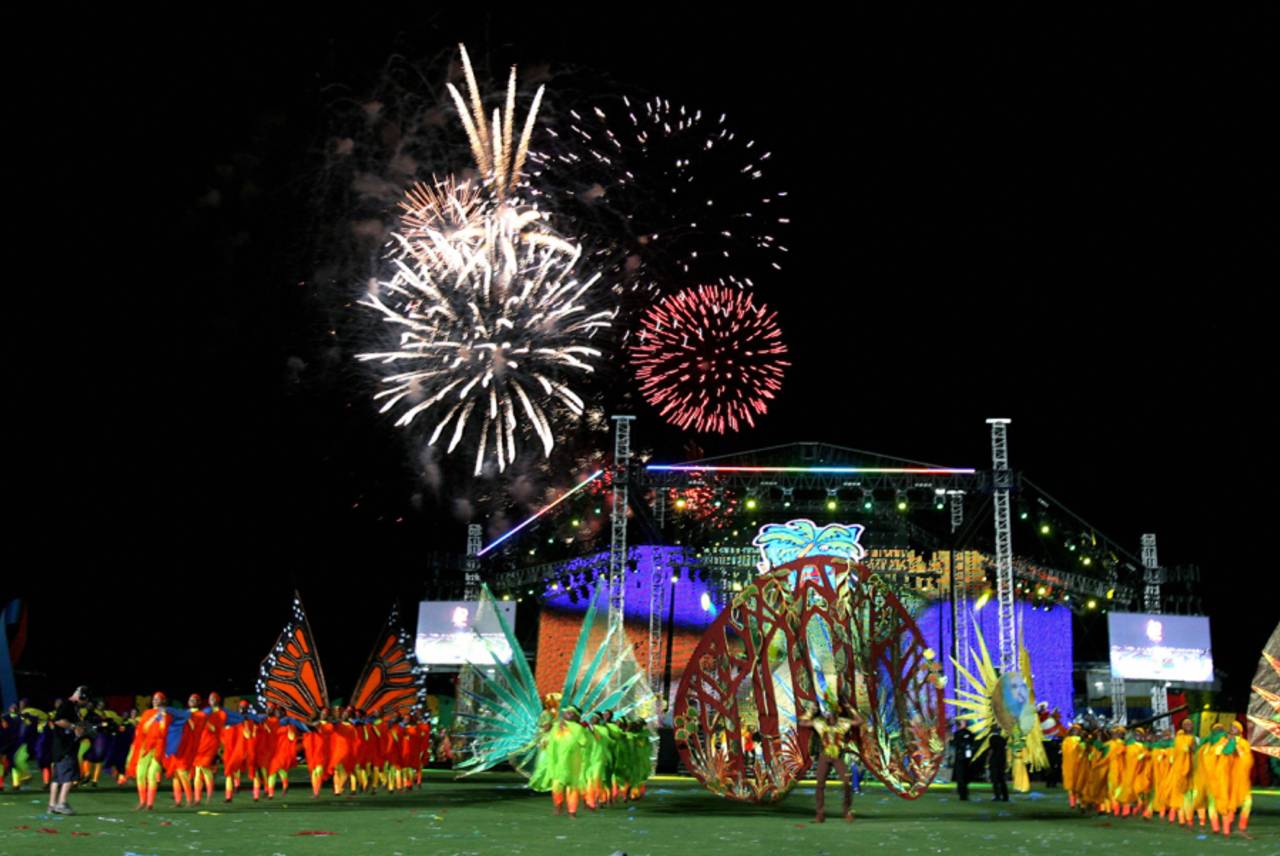 Dancers perform as fireworks illuminate the night sky during the 2007 World Cup opening ceremony, Trelawny, March 11, 2007