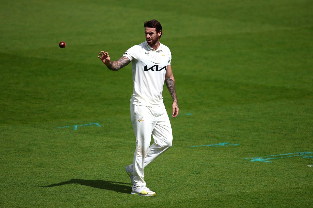 Jordan Clark is thrown the ball, Surrey vs Middlesex, The Oval, May 11, 2023