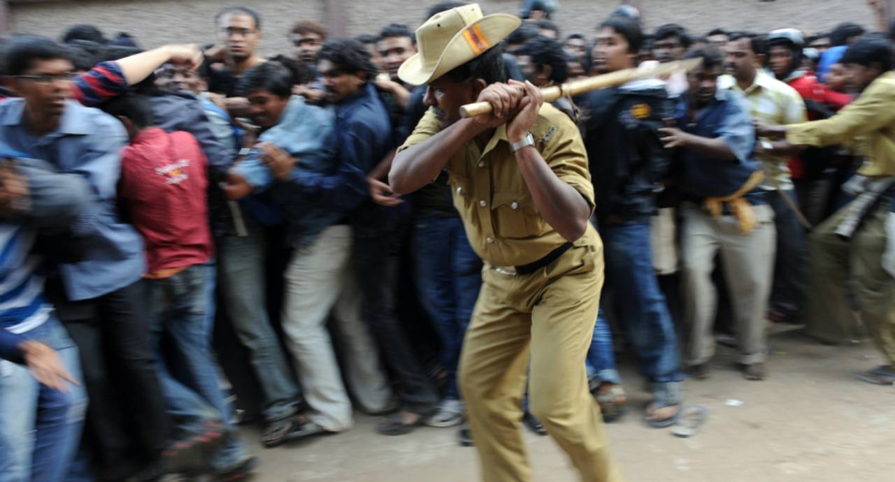 No carrot, all stick: the lathi charge is a depressingly familiar part of the match experience in India